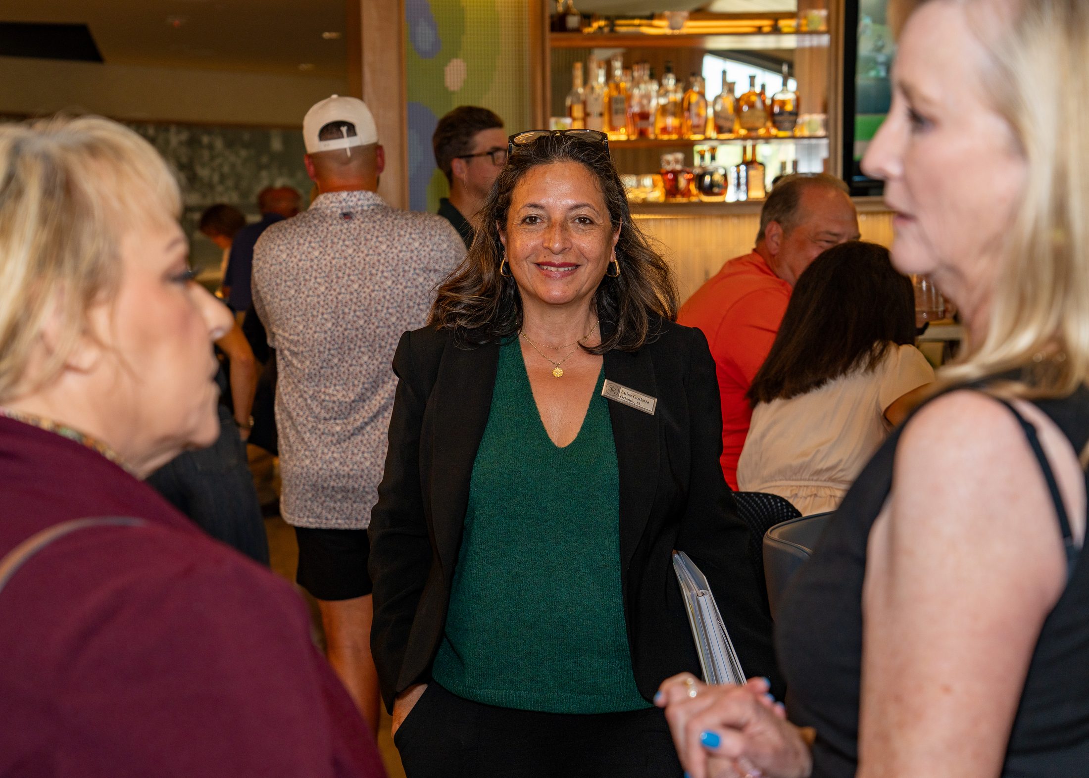 Guests networking inside a restaurant venue during a private event